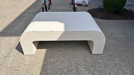 Micro cement coffee table. It’s 30” wide, 46” long and 16” tall